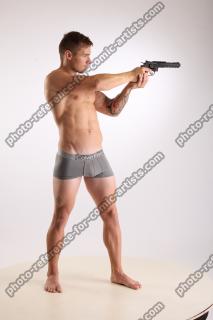 Piero Pose With Revolver